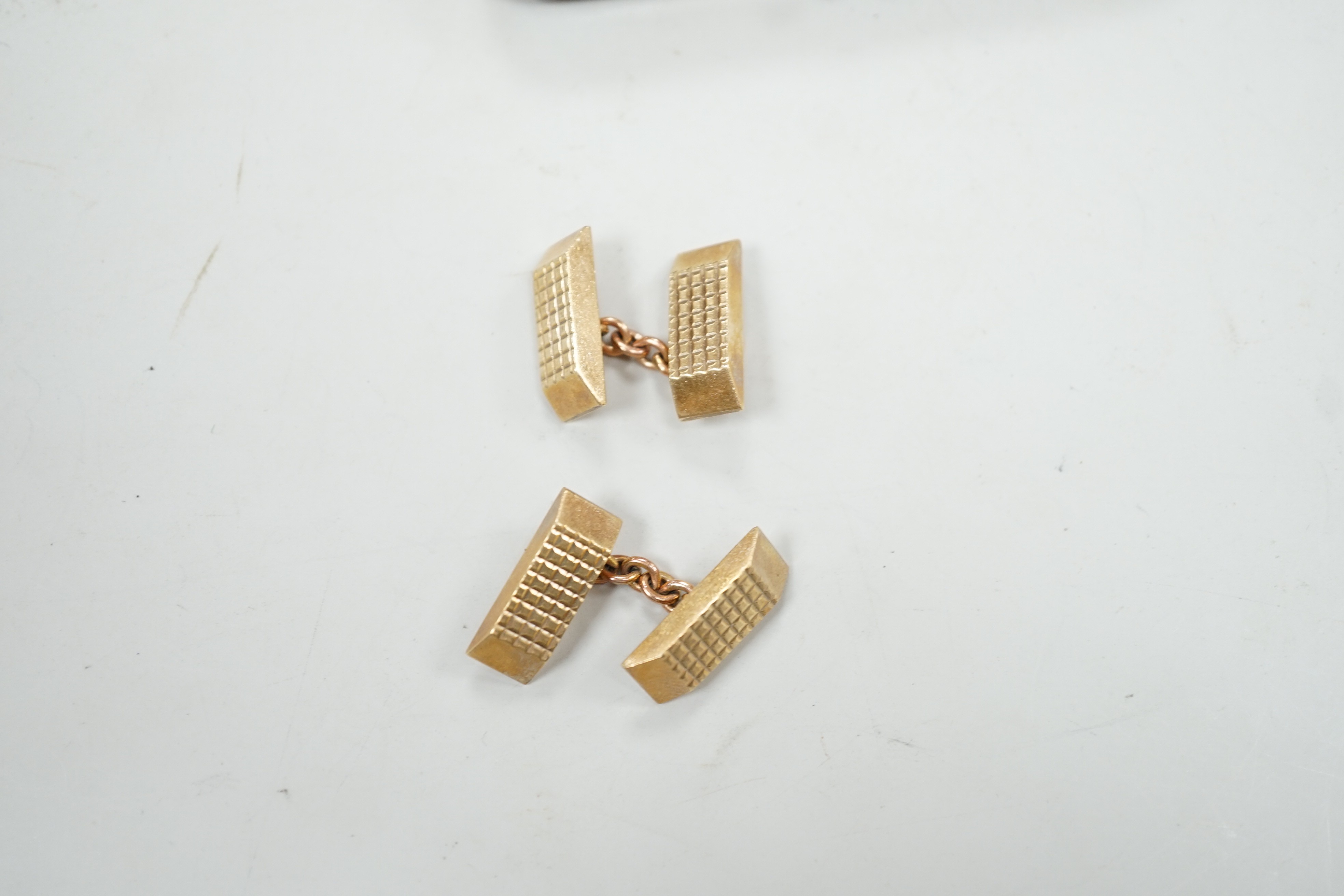 A pair of 9ct gold shaped rectangular cuff links, 19mm, 18.9 grams.